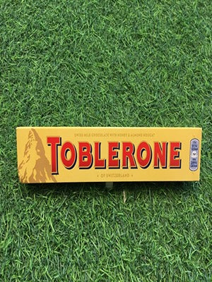 Swiss Milk Chocolate with Honey & Almond Noucat (Toblerone)